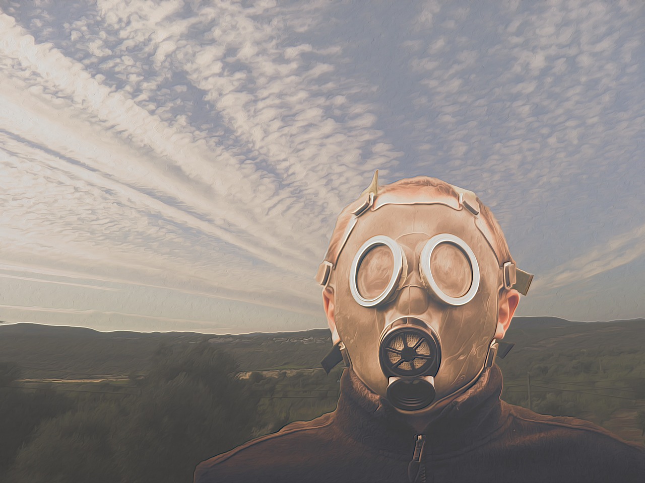 uomo con maschera anti-gas con delle scie chimiche sullo sfondo